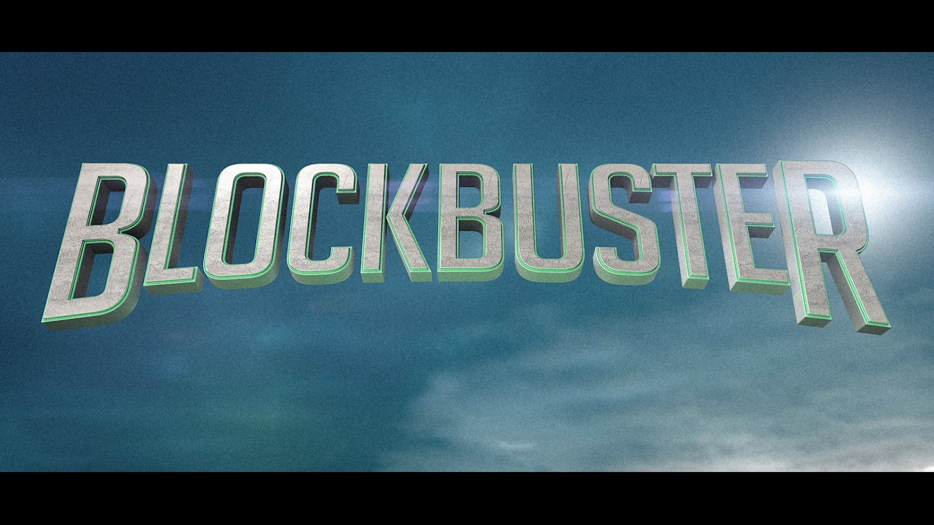 A bold, cinematic-style text reading 'BLOCKBUSTER' in large, metallic letters with a 3D effect, set against a dramatic blue sky with a lens flare effect. The typography has a retro-futuristic feel, evoking the excitement of classic Hollywood movie titles. The design conveys a sense of grandeur and impact, reinforcing the idea of a major event or milestone.